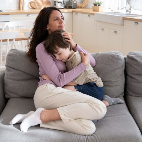 Affectionate Mother Parent Caring Embrace Little Son Expressing